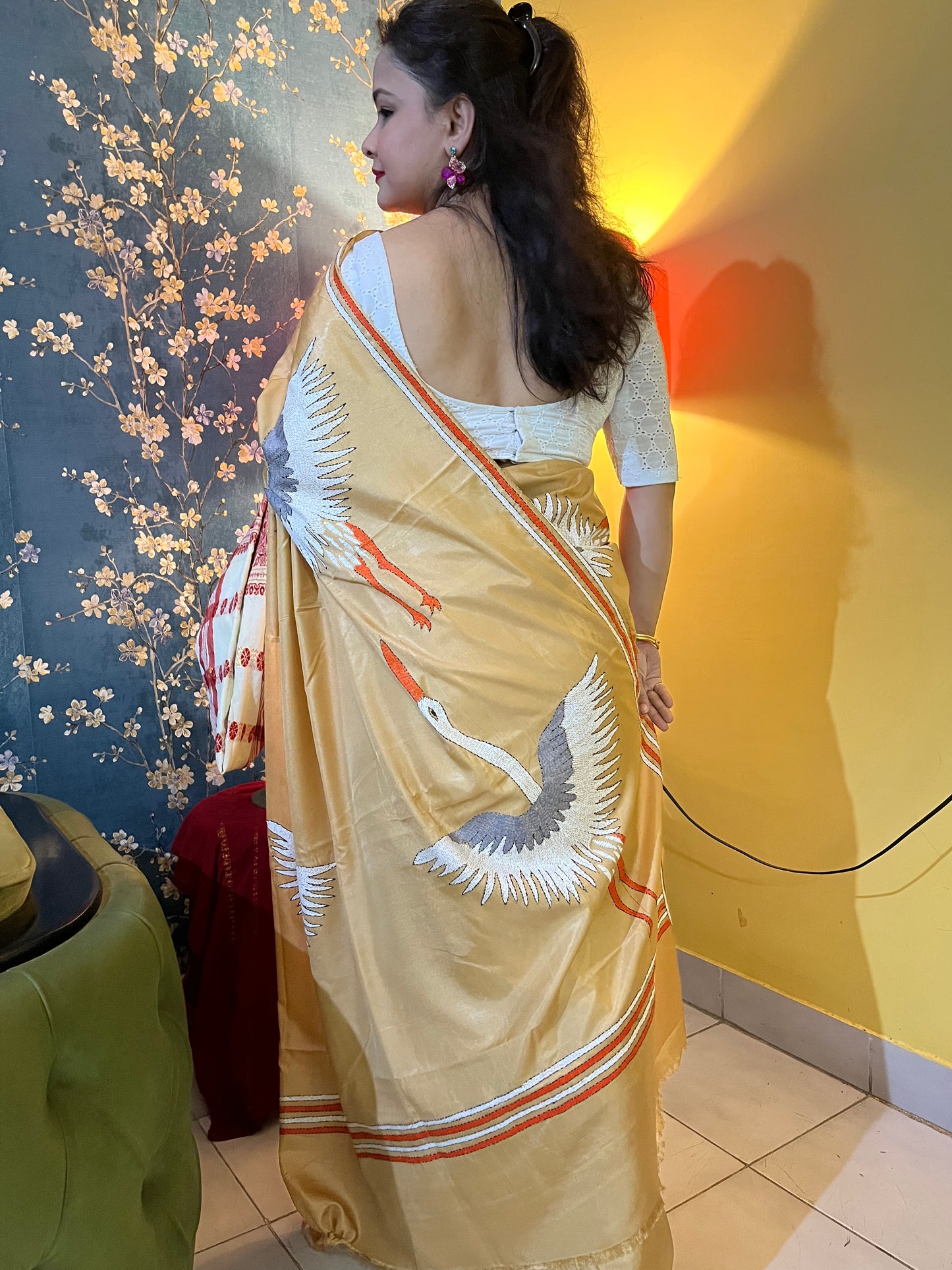 Soft beige handwoven silk texture with authentic kantha stitch embroidery detail
