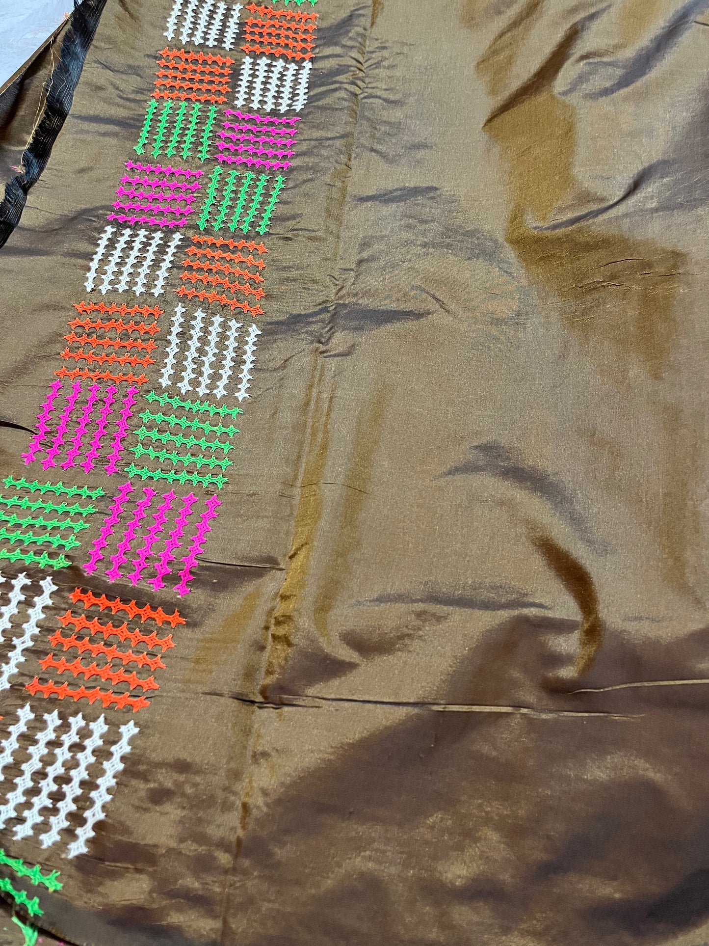 Matching coffee brown blouse piece with coordinating multicolor Kantha stitch details