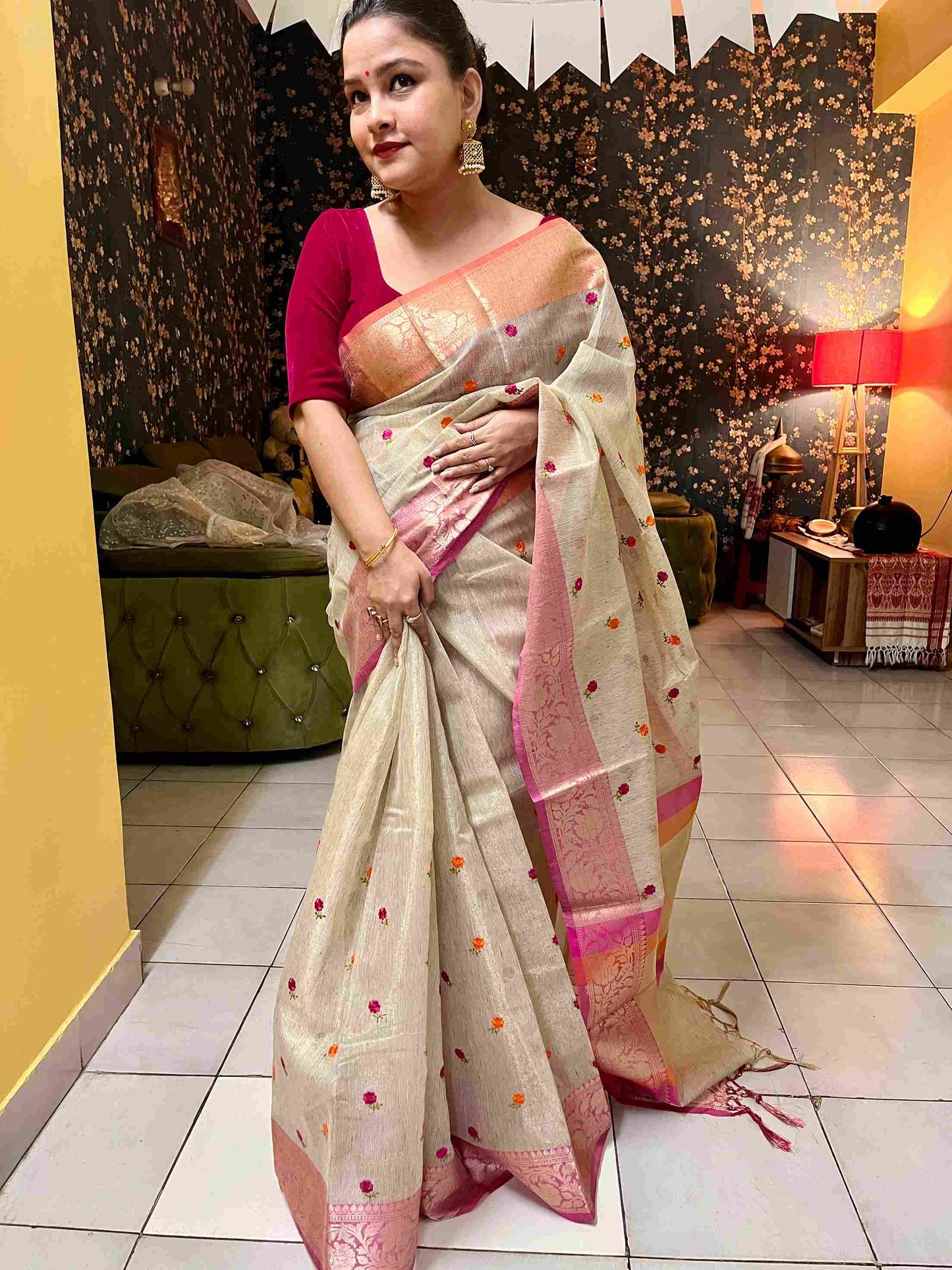Stylish woman in Beige tissue saree showcasing Desi Aadat’s handwoven design