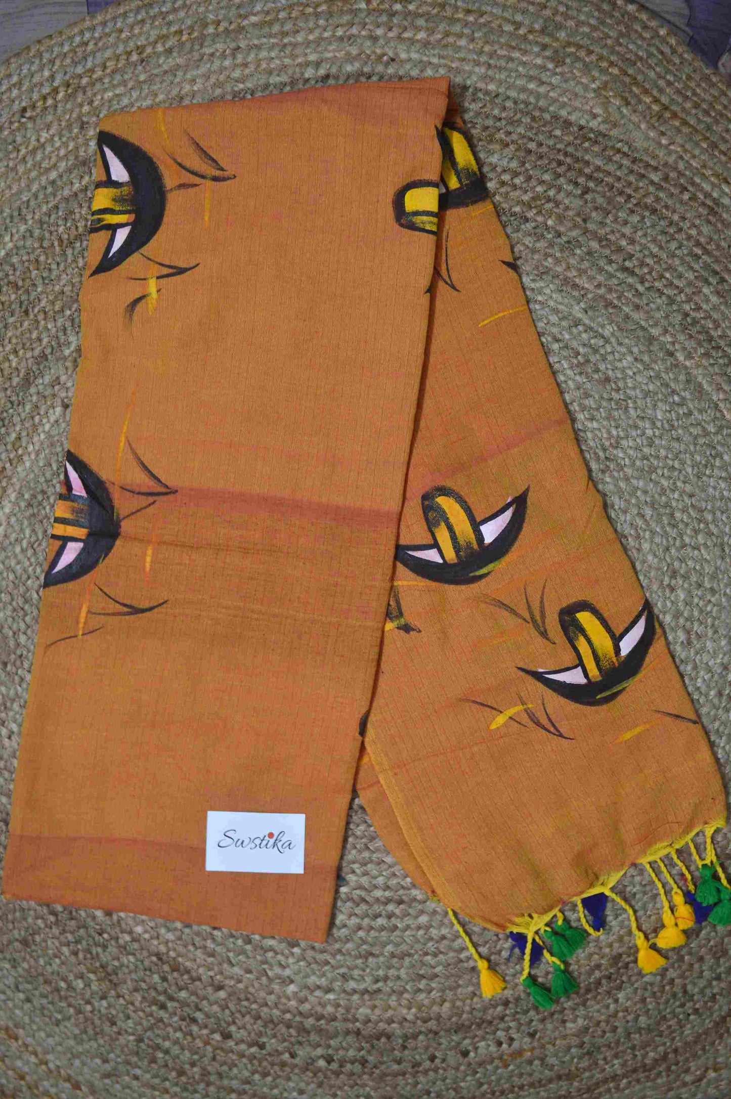 Hand-painted Nauko design mul-cotton saree in Yellowish Brown – A blend of tradition and elegance.