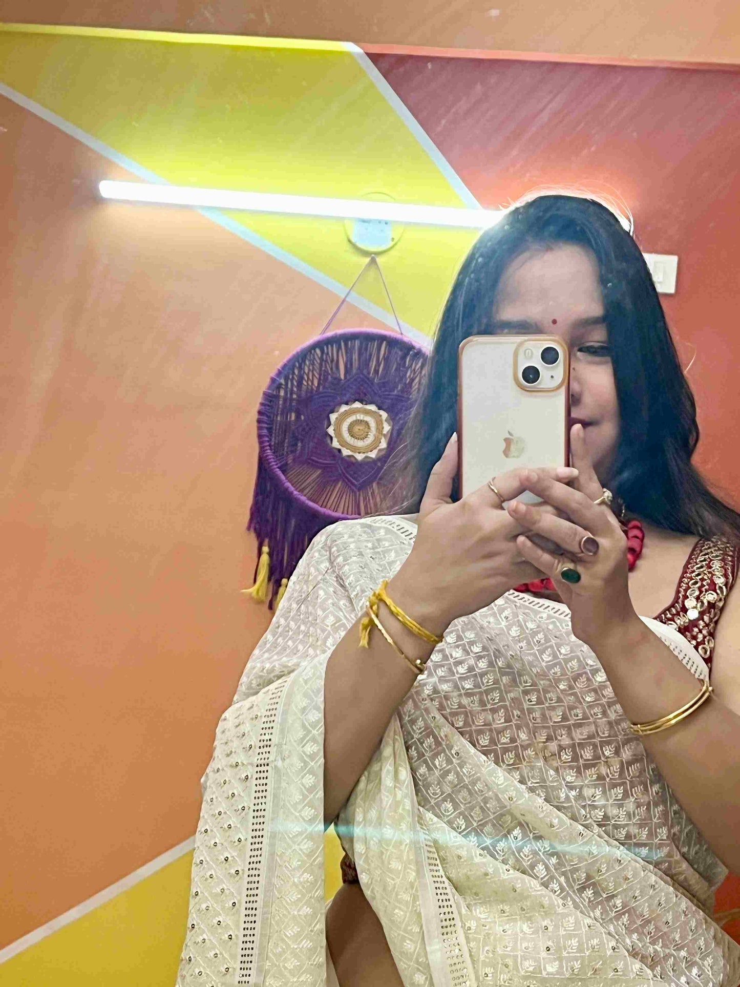 Elegant woman in Off-White georgette saree showcasing Desi Aadat’s party wear design