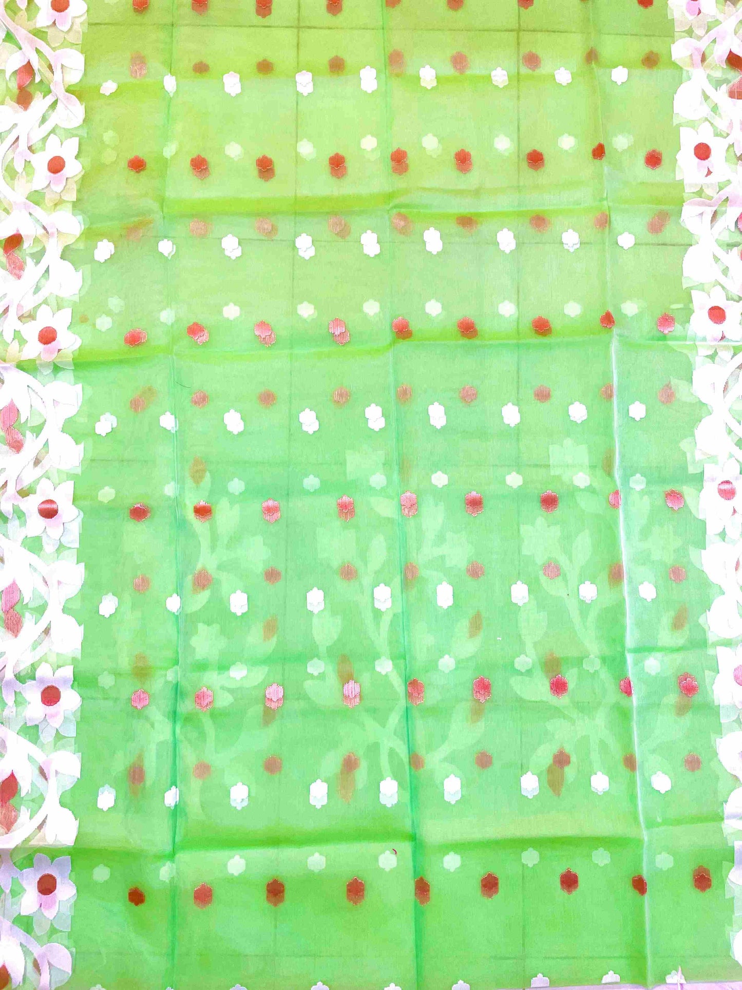 Vibrant woman in Banana Leaf Green handwoven saree showcasing Desi Aadat’s Jamdani design