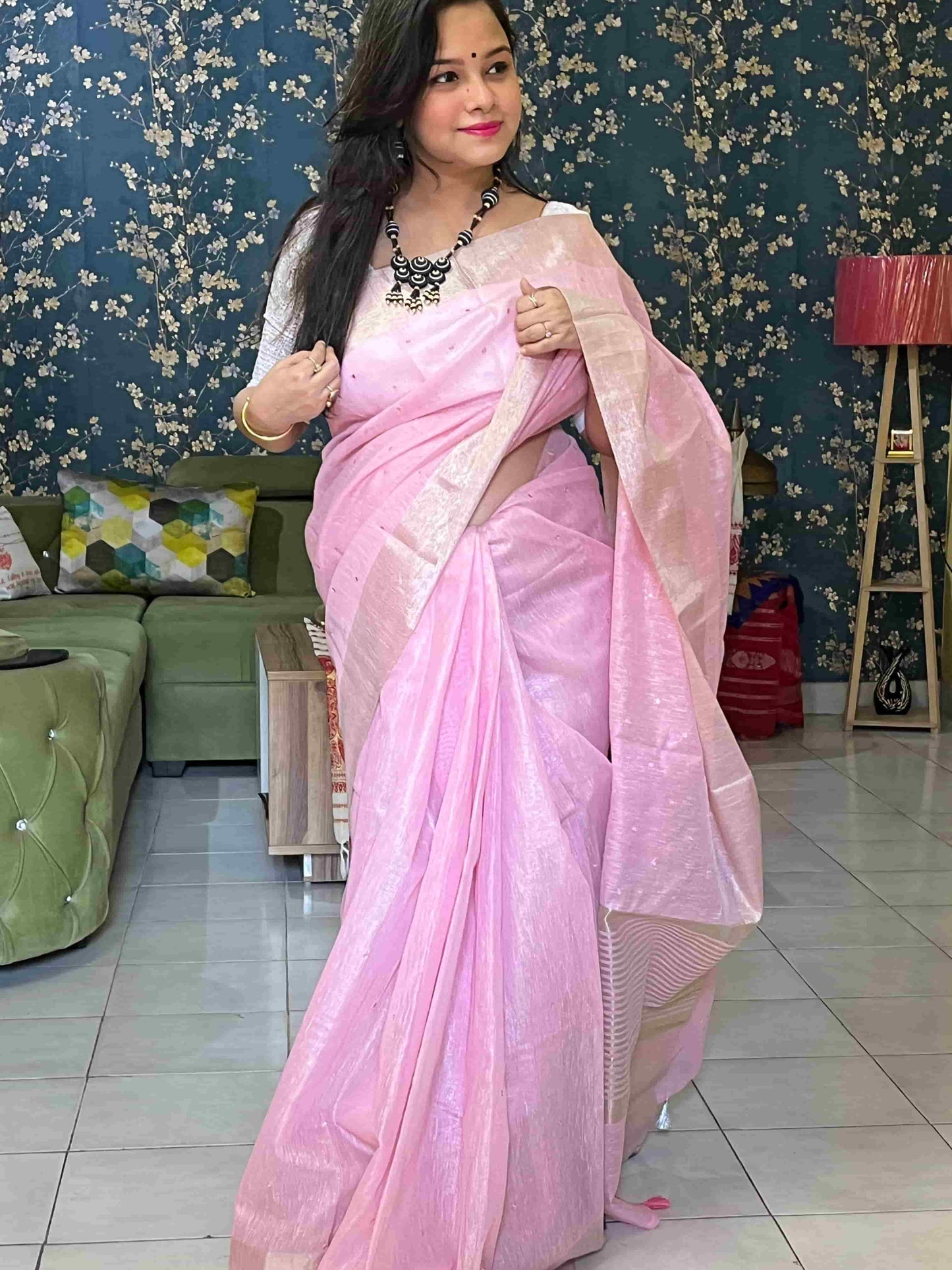 Elegant woman in Baby Pink tissue saree showcasing Desi Aadat’s handwoven design