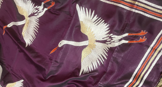 Hand-stitched crane design showcasing Bengali Kantha textile tradition