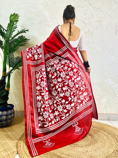 Back view of crimson red batik Bangalore silk saree with white Kantha flower and leaf pallu
