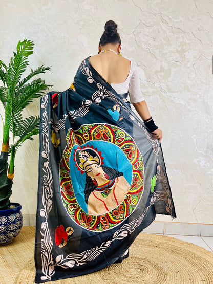Back view of black blended Bangalore silk saree with Kantha face portrait pallu and figure motifs