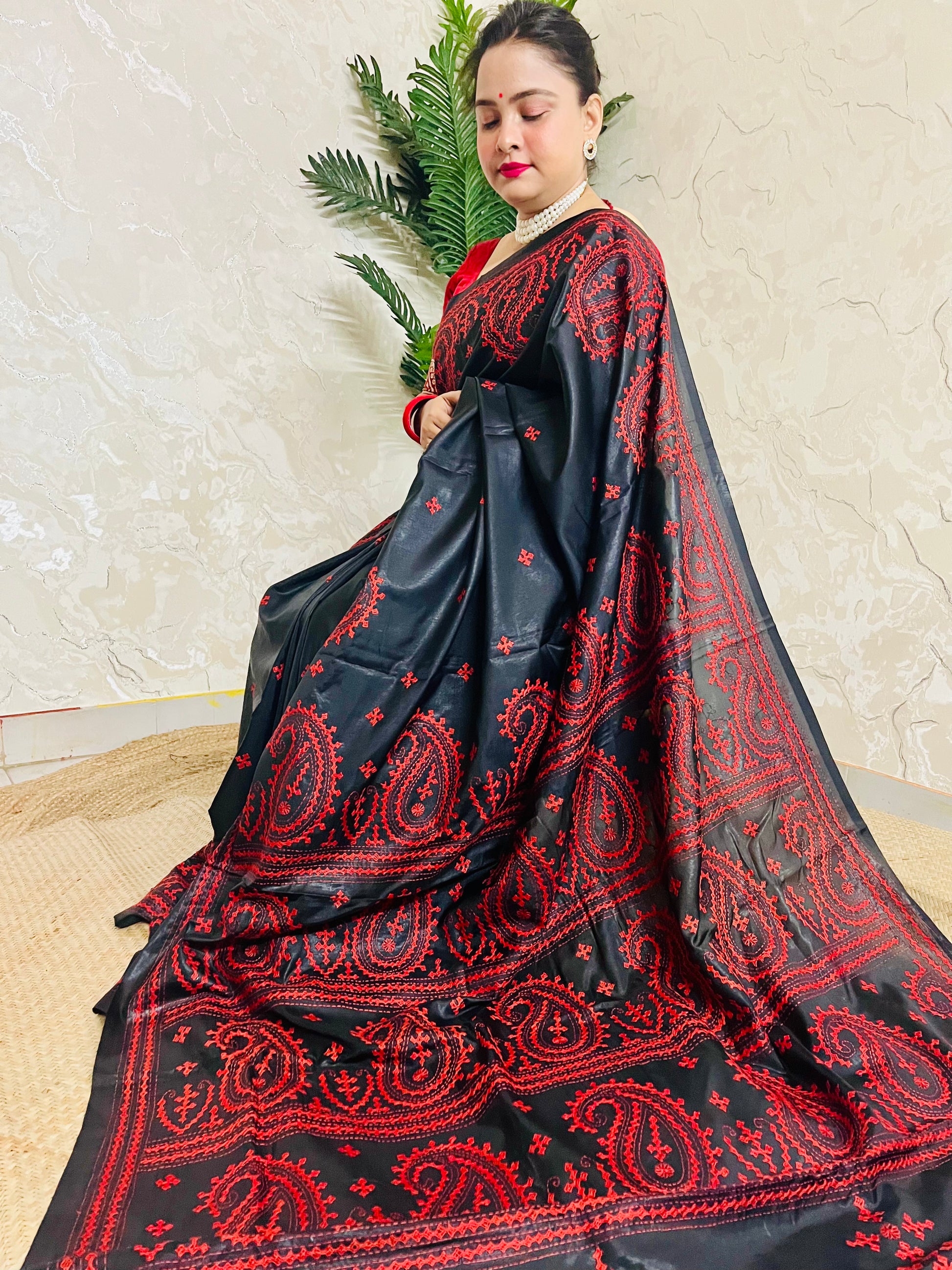 Black Kantha Stitch Saree with vibrant red paisley embroidery handcrafted by Desi Aadat artisans