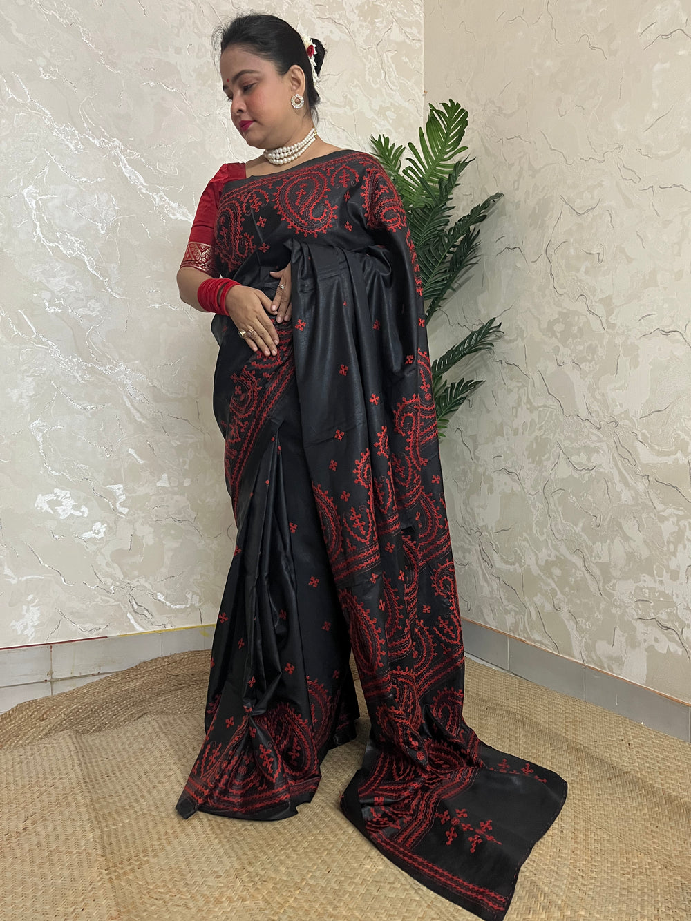 Black Kantha Stitch Saree with vibrant red paisley embroidery handcrafted by Desi Aadat artisans