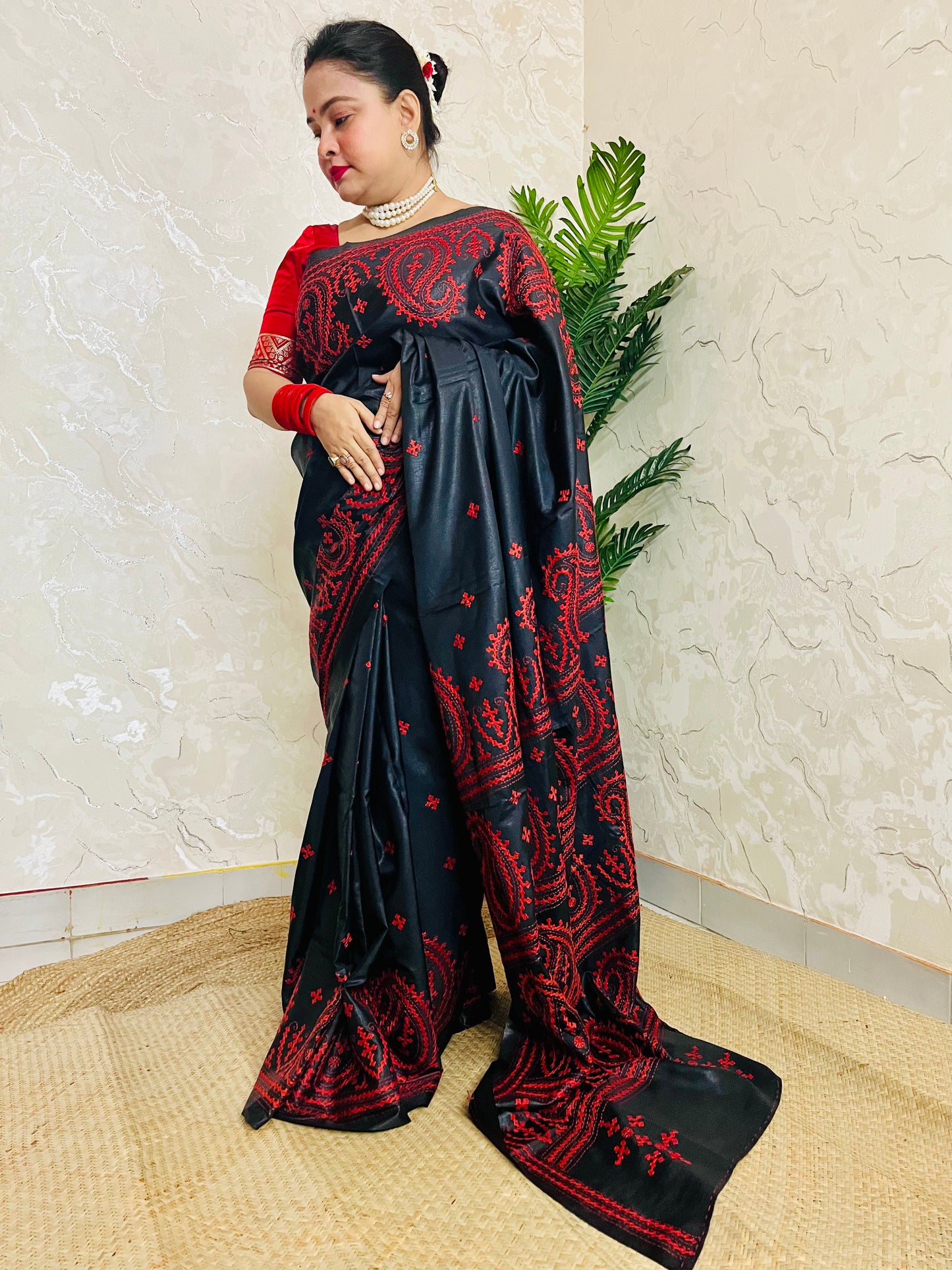 Black Kantha Stitch Saree with vibrant red paisley embroidery handcrafted by Desi Aadat artisans