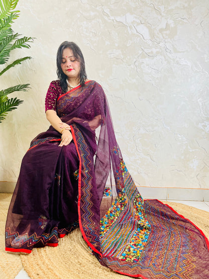 Handmade Jamun purple organza silk saree with multicolour Bullion Stitch floral embroidery and zigzag running stitch — side sitting drape view, Desi Aadat
