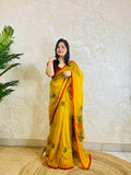 Limited edition mustard yellow Bullion Stitch French Knot organza silk saree draped on model — full front standing view by Desi Aadat