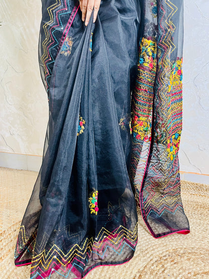 Close-up of handcrafted Bullion Stitch floral embroidery and French knots with multicolored zigzag running stitch on pure Black Organza Silk Saree by Desi Aadat