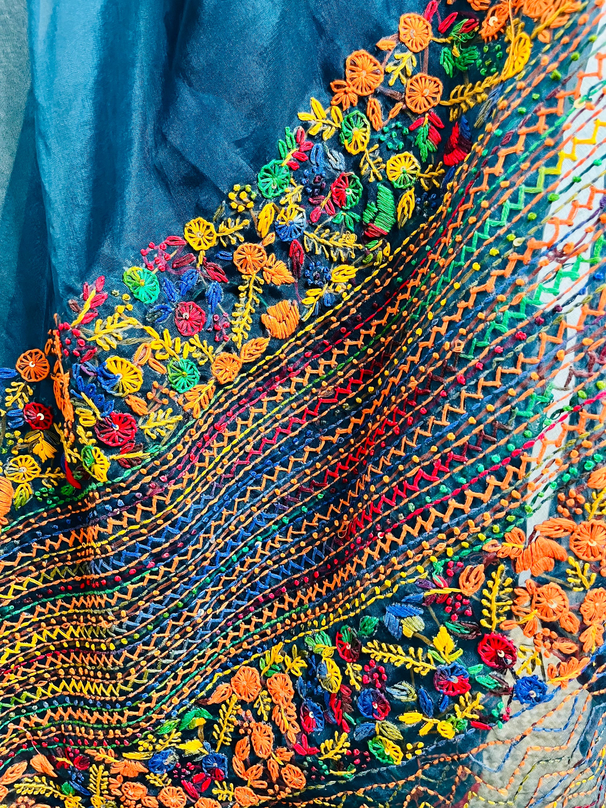 Close-up of handmade bullion stitch and French knot embroidery in multicolour threads on pure indigo organza silk saree by Desi Aadat — exclusive limited edition heritage saree