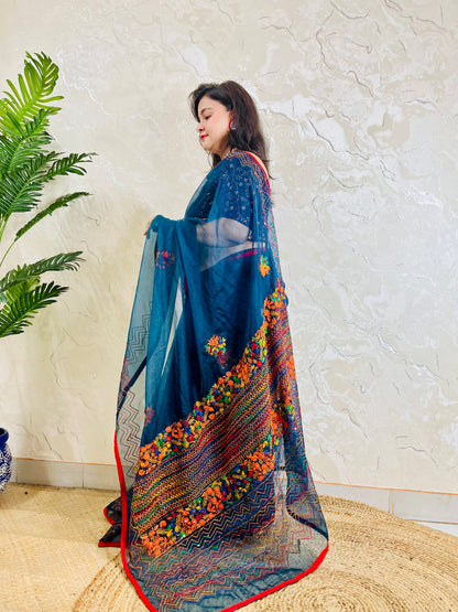 Full drape side view of Desi Aadat pure indigo organza silk saree adorned with handmade bullion stitch embroidery and French knot detailing — exclusive handcrafted Indian saree