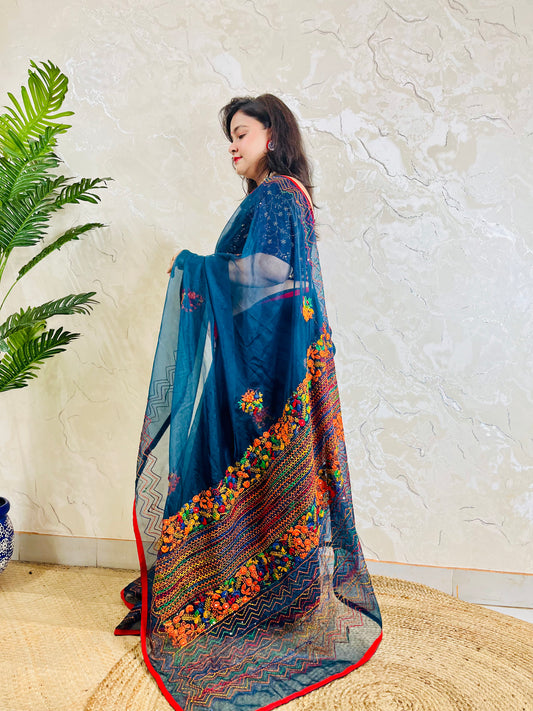 Full drape side view of Desi Aadat pure indigo organza silk saree adorned with handmade bullion stitch embroidery and French knot detailing — exclusive handcrafted Indian saree