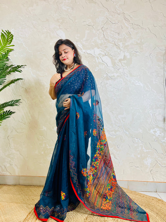 Full drape side view of Desi Aadat pure indigo organza silk saree adorned with handmade bullion stitch embroidery and French knot detailing — exclusive handcrafted Indian saree