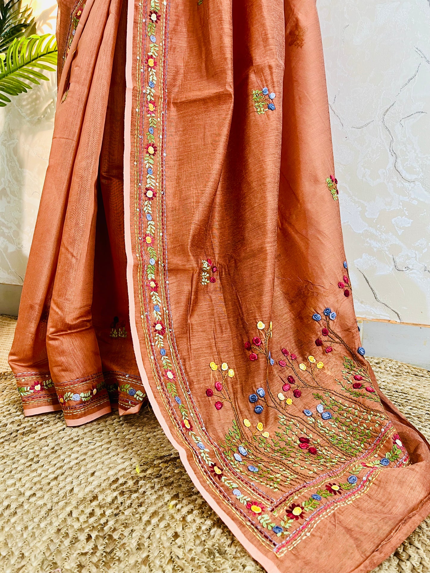 Close-up of Bullion Stitch and French Knot hand embroidery on copper-brown Chanderi silk cotton saree border – Desi Aadat