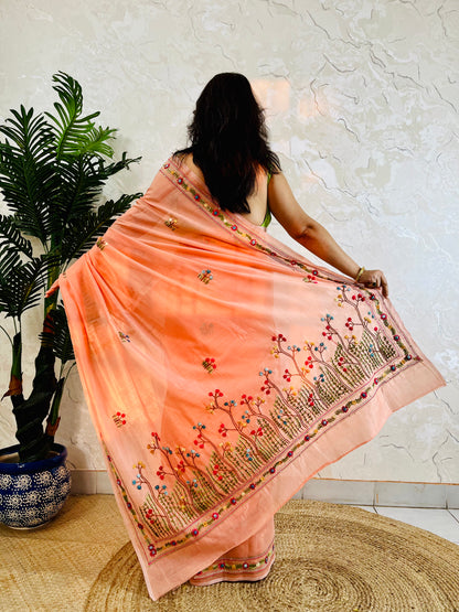 Close-up of Bullion Stitch and French Knot hand embroidery on pastel peach Chanderi silk cotton saree pallu – Desi Aadat