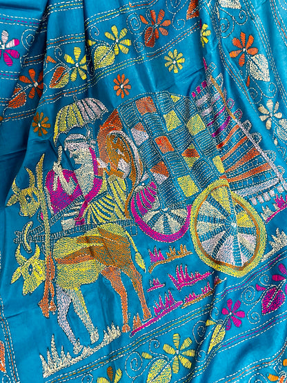Close-up of bullock cart Kantha embroidery on peacock blue Bangalore silk saree