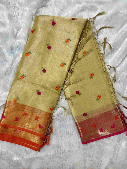 Close-up of embroidery on Sandal Wood cotton tissue saree fabric