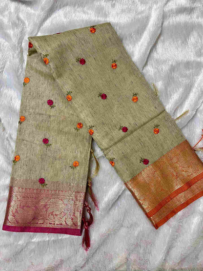 Stylish woman in Beige tissue saree showcasing Desi Aadat’s handwoven design