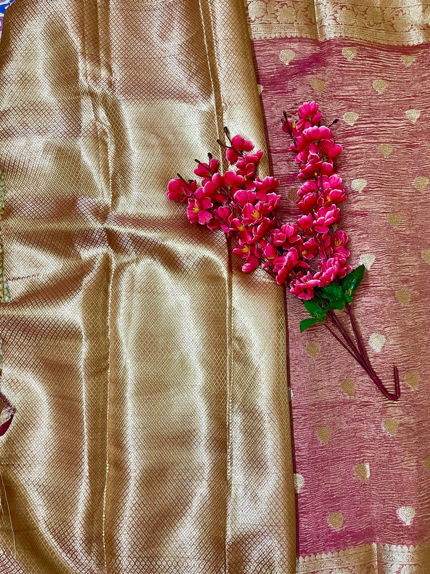 Elegant woman in Peach crush tissue saree showcasing Desi Aadat’s handwoven design