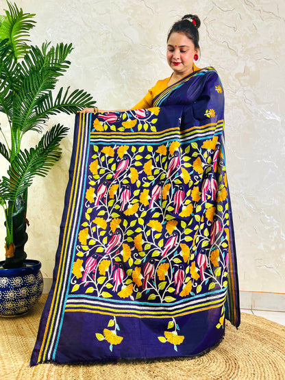 Front standing view of navy blue Kantha stitch saree with mustard bird motif