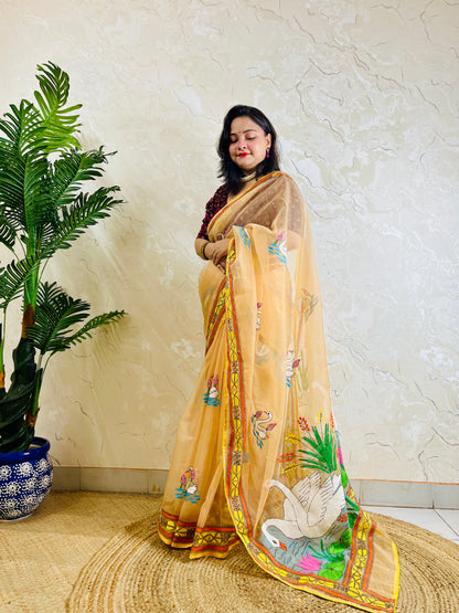 Beige-gold Kantha stitch organza saree with swan and lotus motif, front standing drape view