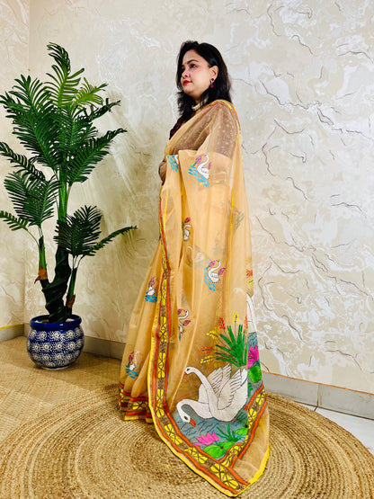 Beige-gold Kantha stitch organza saree with swan and lotus motif, front standing drape view