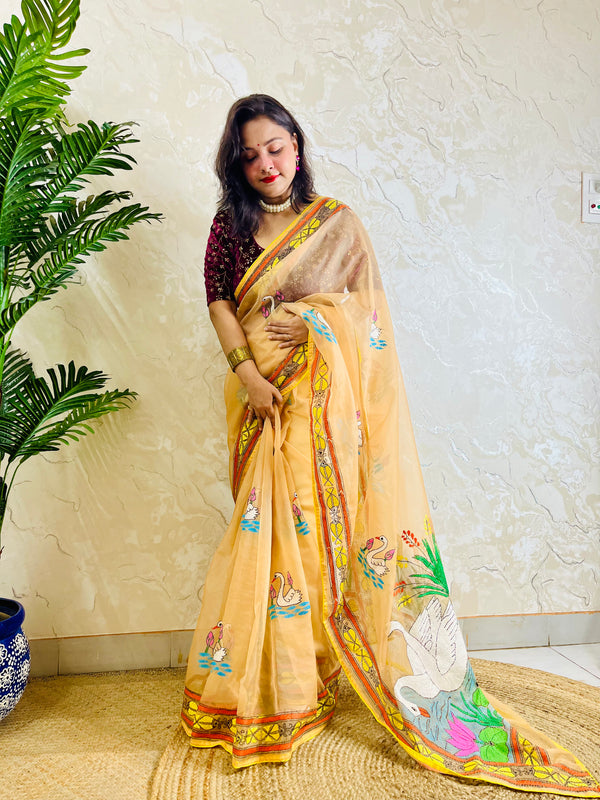 Beige-gold Kantha stitch organza saree with swan and lotus motif, front standing drape view
