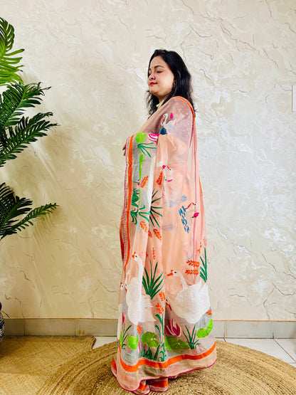 Detailed pallu close-up of handcrafted swan and lotus Kantha embroidery on sheer organza saree fabric