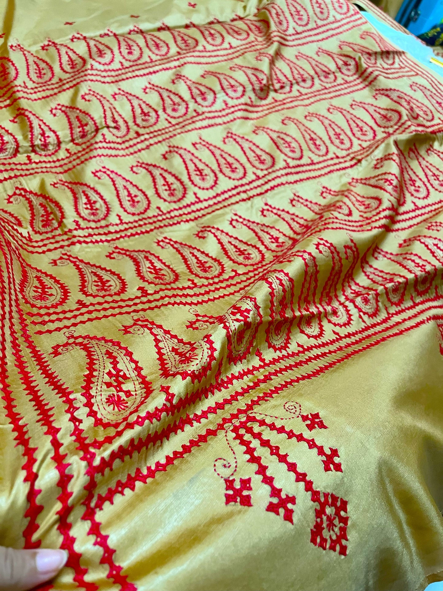 Detailed texture of handwoven Blended Bangalore Silk with raised paisley thread embroidery work