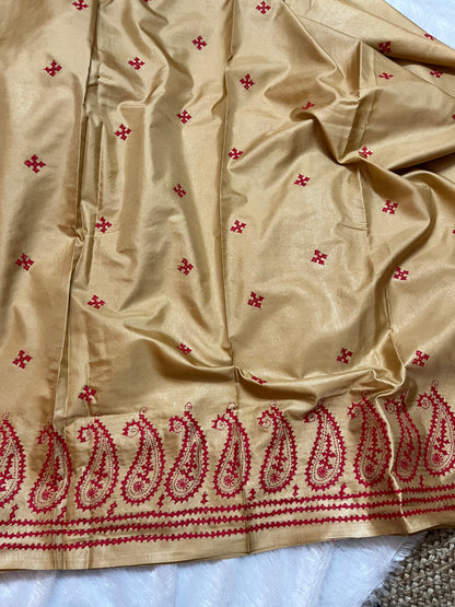 Matching golden yellow blouse piece with coordinating paisley Kantha stitch details