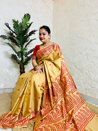 Golden yellow Kantha Stitch Saree with intricate paisley motif embroidery handcrafted by Desi Aadat artisans