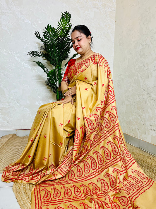Golden yellow Kantha Stitch Saree with intricate paisley motif embroidery handcrafted by Desi Aadat artisans
