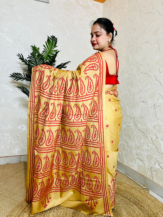 Golden yellow Kantha Stitch Saree with intricate paisley motif embroidery handcrafted by Desi Aadat artisans