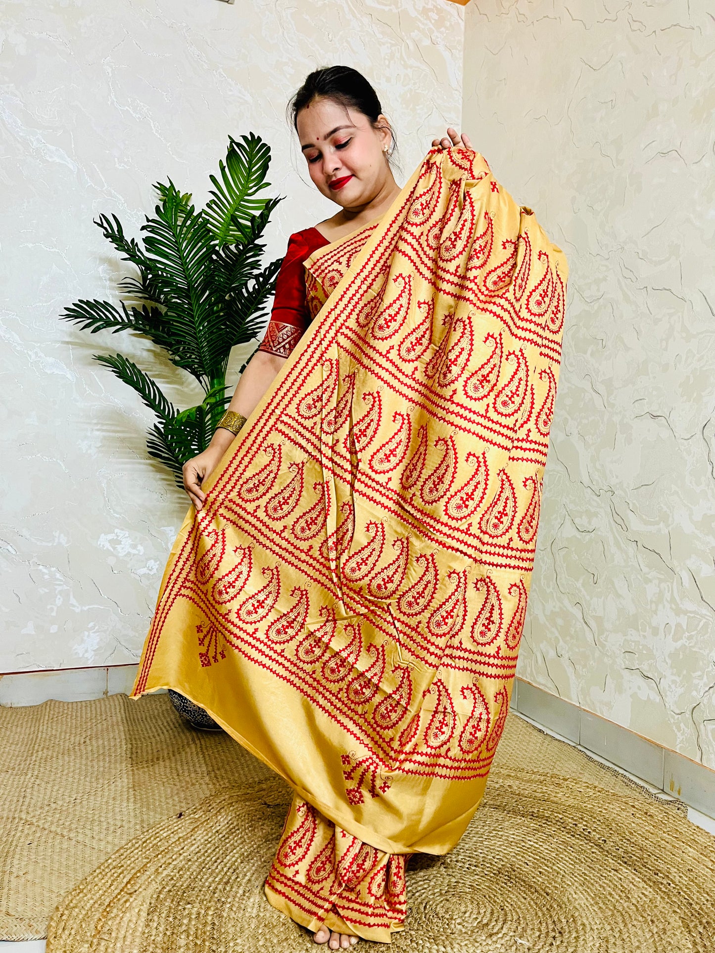 Golden yellow Kantha Stitch Saree with intricate paisley motif embroidery handcrafted by Desi Aadat artisans
