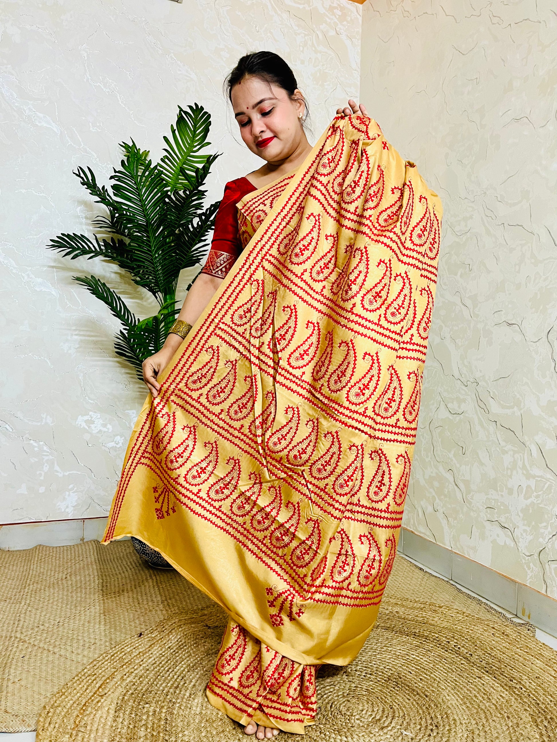 Golden yellow Kantha Stitch Saree with intricate paisley motif embroidery handcrafted by Desi Aadat artisans