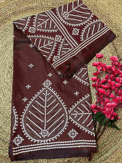 Detailed view of Kutch work saree embroidery on Maroon Brown silk fabric