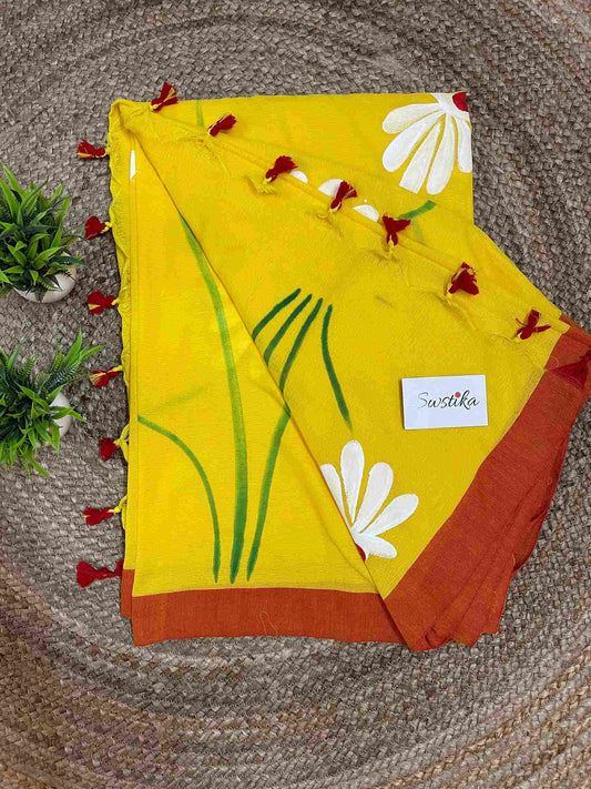 Hand-painted Shapla design mul-cotton saree in Yellow – A handcrafted heritage piece.
