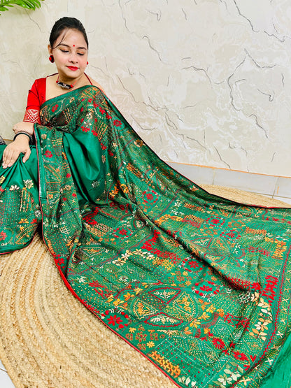 Emerald green Lambani hand stitch saree with gold thread embroidery, seated pallu view