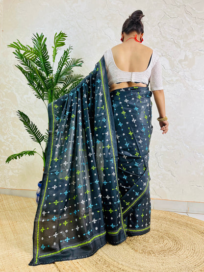 Back view showing black saree blouse and Gujarati stitch embroidery pattern