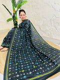 Woman seated wearing black Kutch embroidery saree, Bangalore silk fabric detail