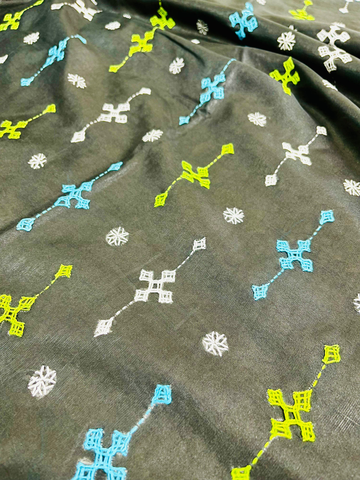 Close view of hand embroidered pallu on black blended Bangalore silk saree