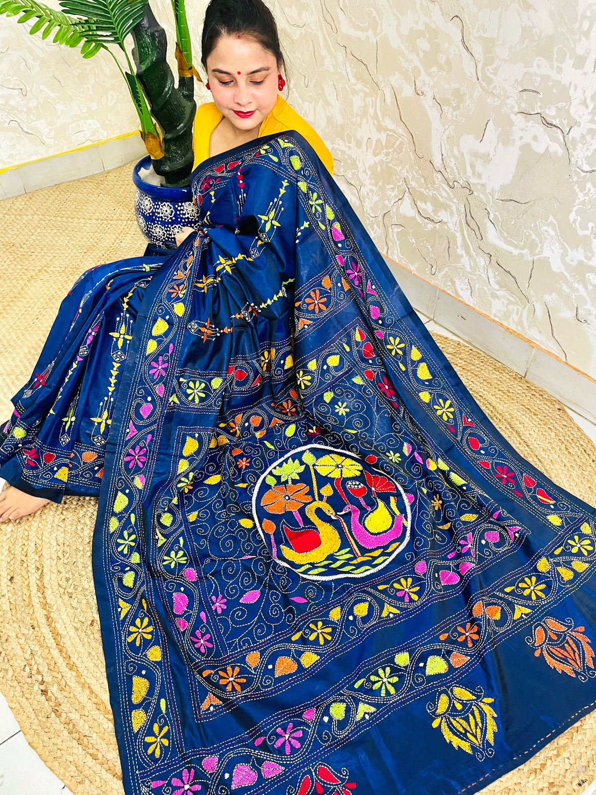 Ink blue Kantha saree with swan medallion motif, seated pallu detail view