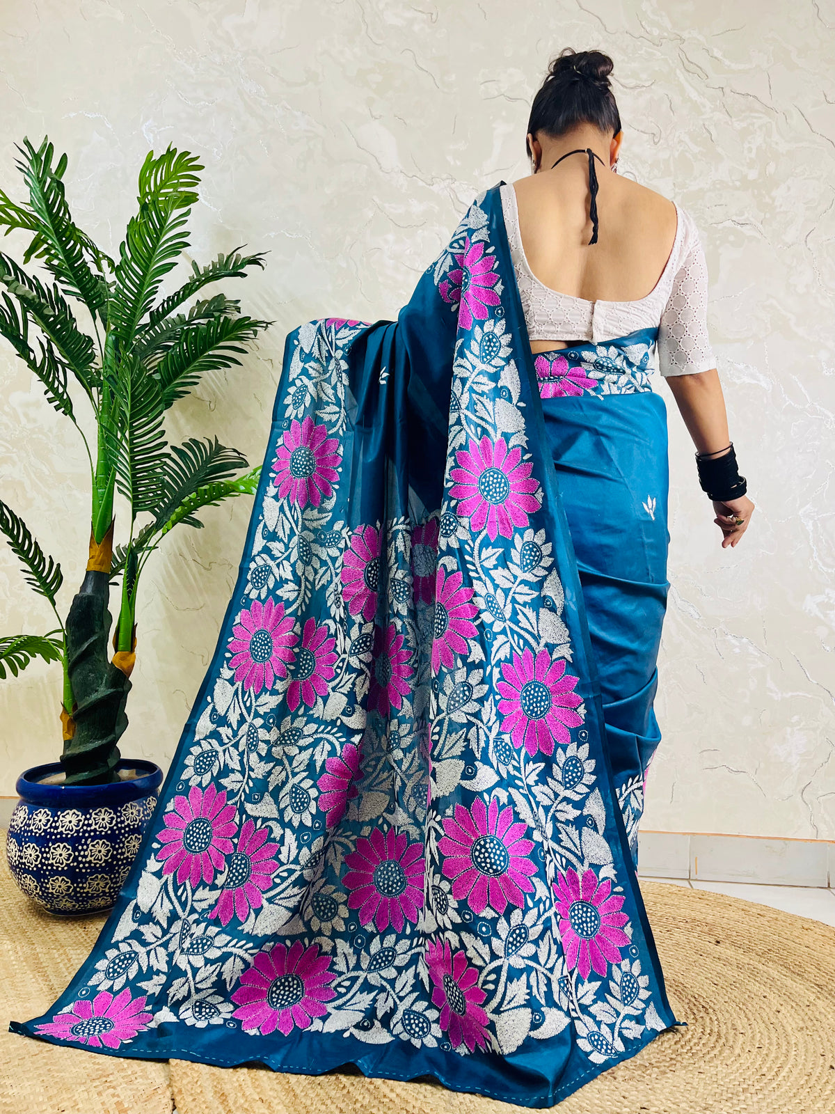 Back view of peacock blue blended Bangalore silk saree with sunflower Kantha pallu
