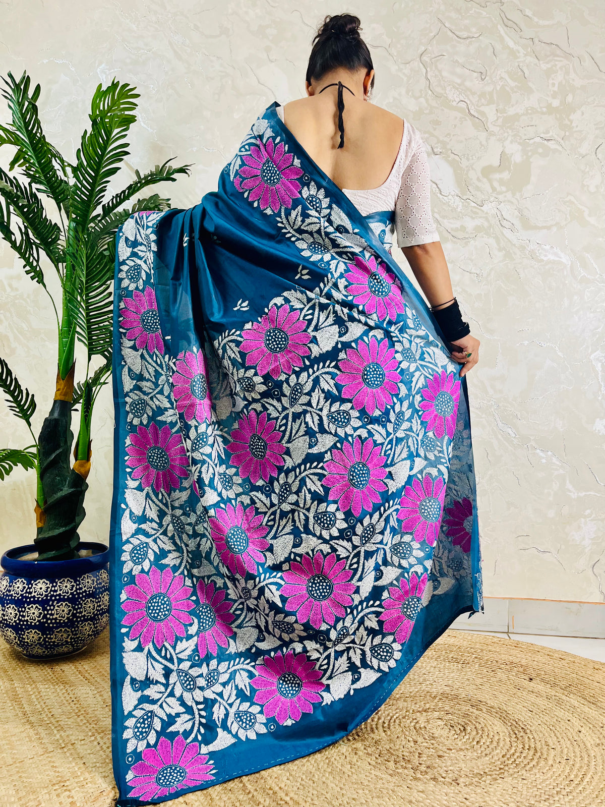 Back view of peacock blue blended Bangalore silk saree with sunflower Kantha pallu