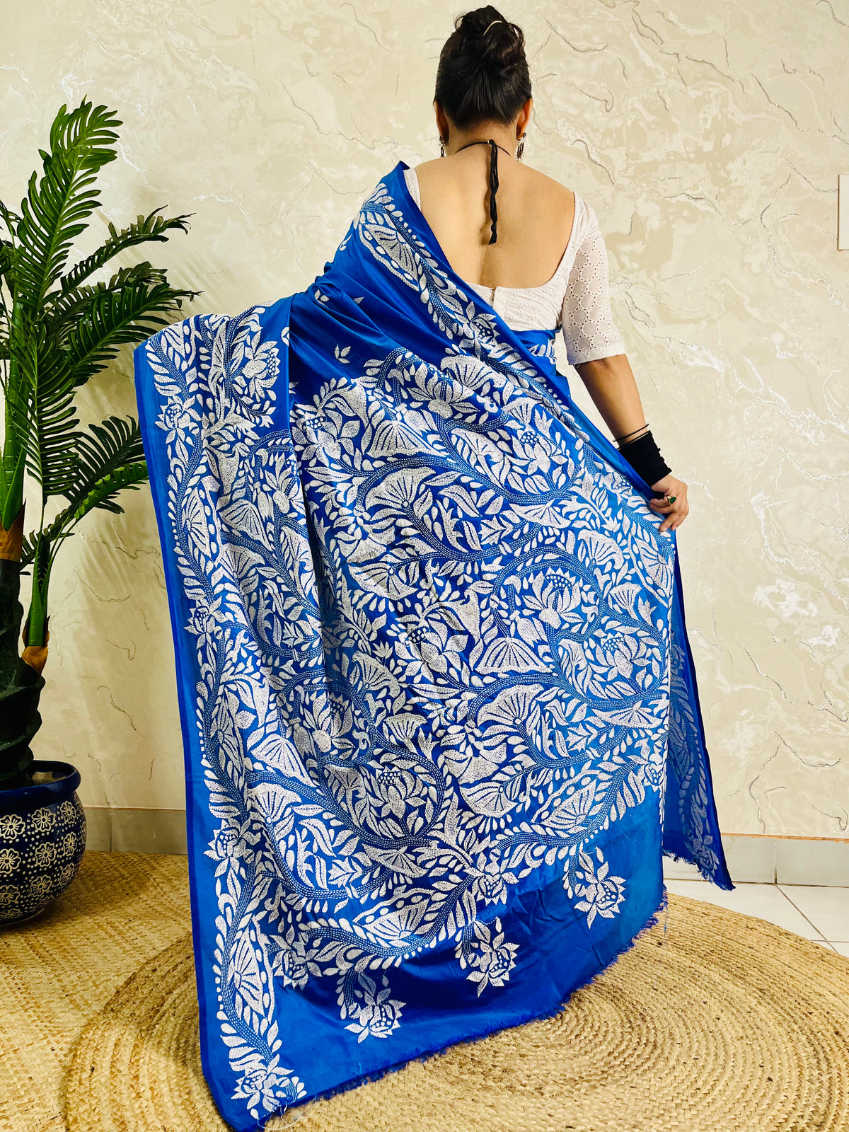 Back view of royal blue Kantha stitch saree with white branch and leaf pallu on Bangalore silk