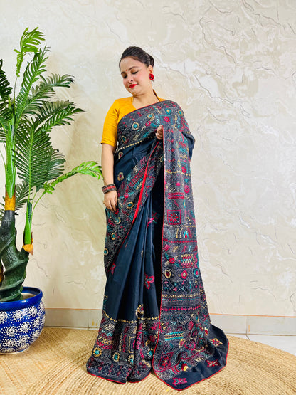 Black Lambani hand stitch saree, back pallu draped standing view