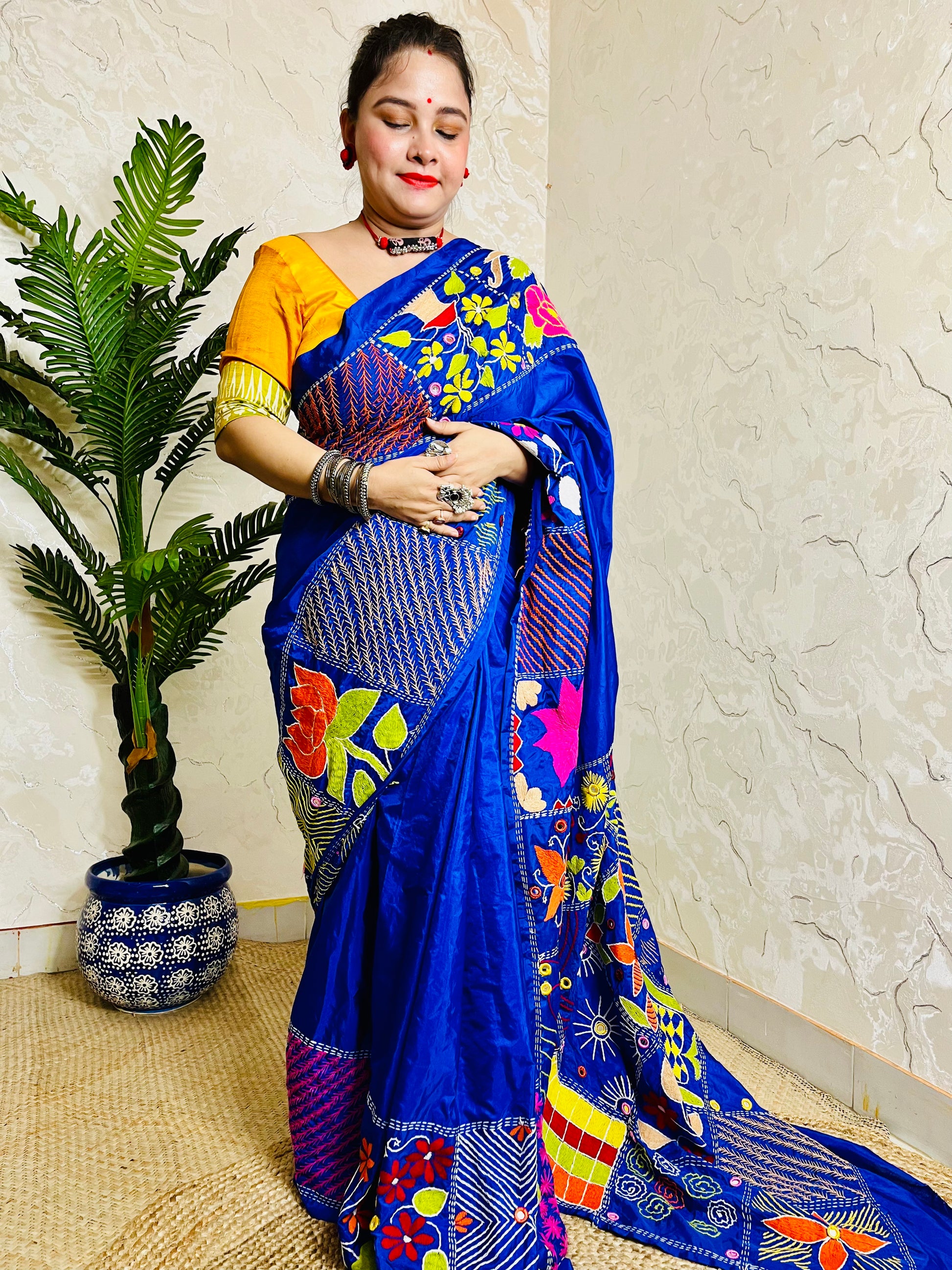 Indian woman styling handcrafted blue silk saree ethnic look